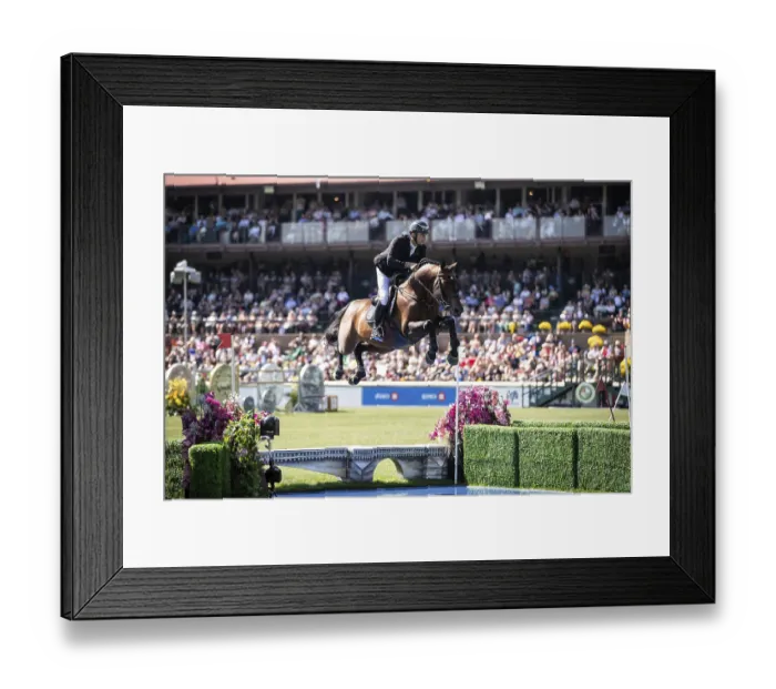 Framed Print : Richard Vogel of Germany and riding United Touchs compete in the first round of the 1