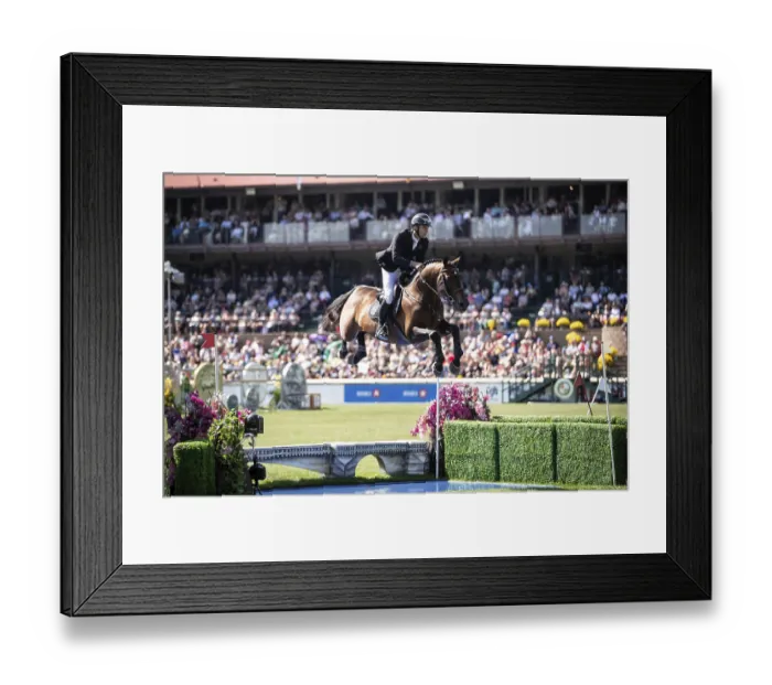 Framed Print : Richard Vogel of Germany and riding United Touchs compete in the first round of the 1