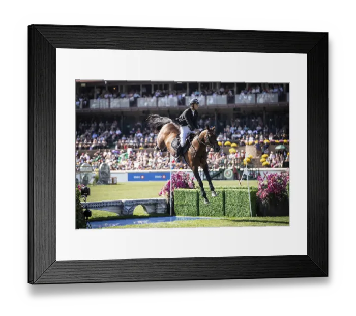 Framed Print : Richard Vogel of Germany and riding United Touchs compete in the first round of the 1