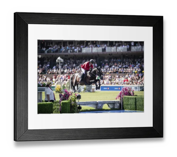 Framed Print : Pius Schwizer of Switzerland and riding Vancouver De Lanlore compete in the first round of the 1