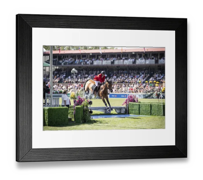 Framed Print : Ben Asselin of Canada and riding Luikan Q compete in the first round of the 1