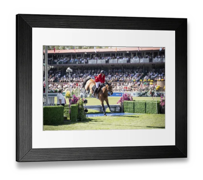 Framed Print : Ben Asselin of Canada and riding Luikan Q compete in the first round of the 1