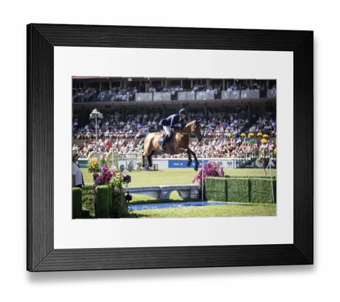 Framed Print : Daniel Deusser of Germany and riding Killer Queen VDM compete in the first round of the 1