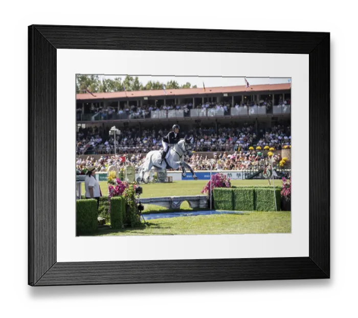 Framed Print : Darragh Kenny of Ireland and riding VDL Cartello compete in the first round of the 1