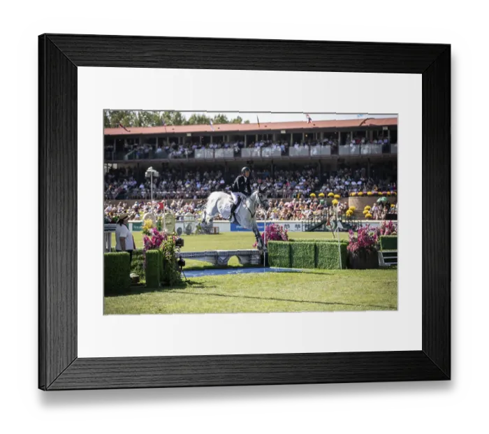 Framed Print : Darragh Kenny of Ireland and riding VDL Cartello compete in the first round of the 1