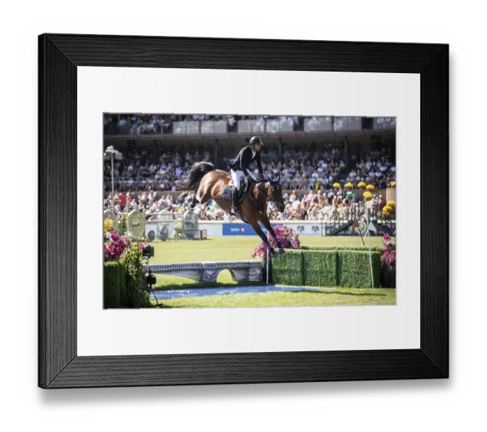 Framed Print : Nayel Nassar of Egypt and riding Capital Night Star compete in the first round of the 1