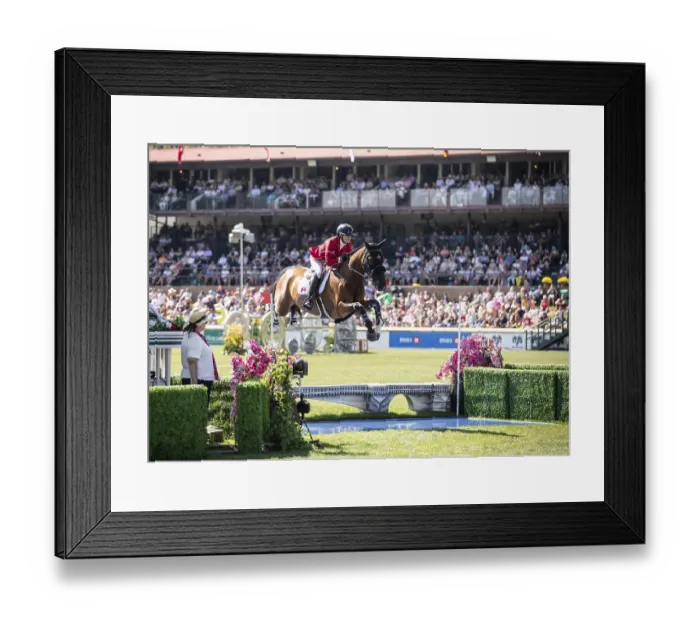 Framed Print : Tiffany Foster of Canada and riding Figor compete in the first round of the 1