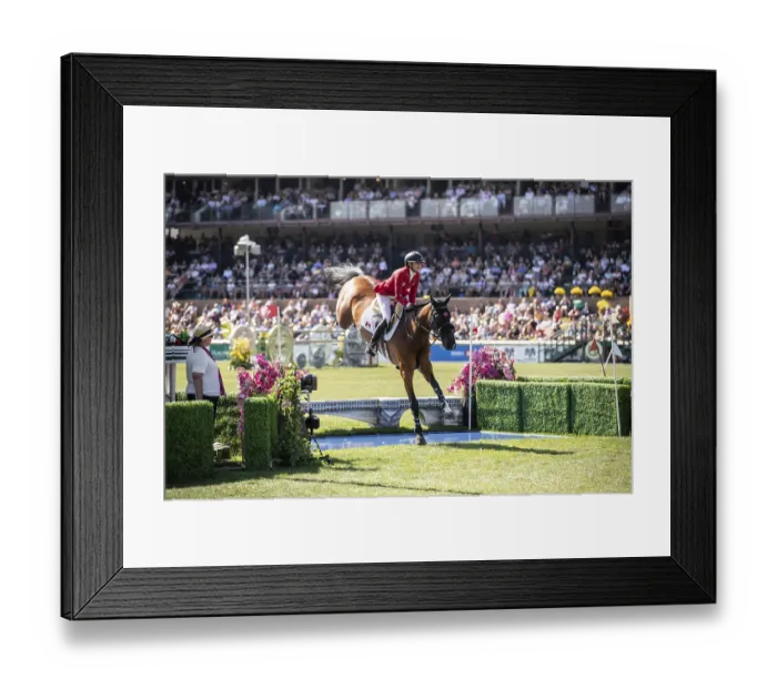 Framed Print : Tiffany Foster of Canada and riding Figor compete in the first round of the 1
