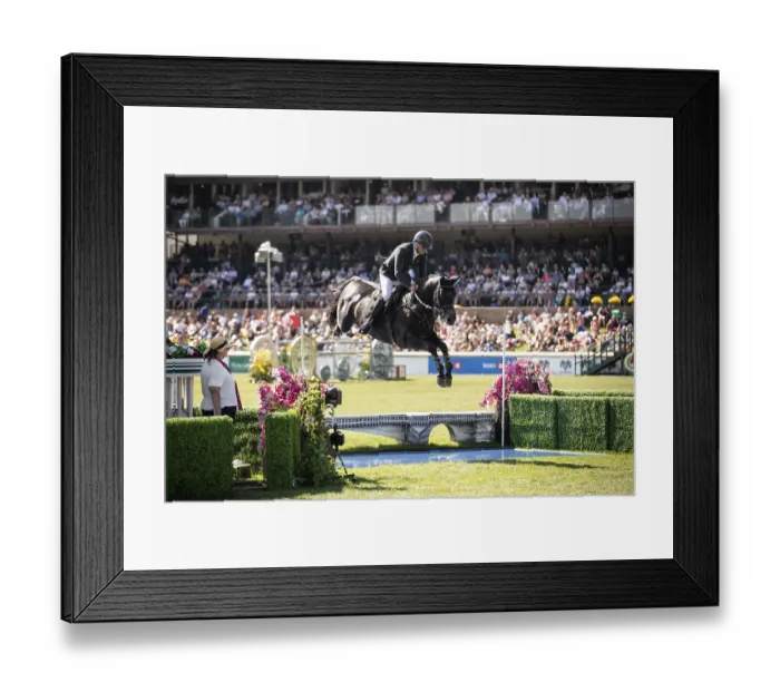 Framed Print : Kristaps Neretnieks of Latvia and riding Palladium KJV compete in the first round of the 1