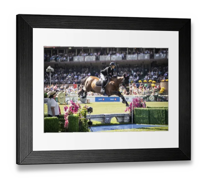 Framed Print : Katie Laurie of Australia and riding Django II compete in the first round of the 1
