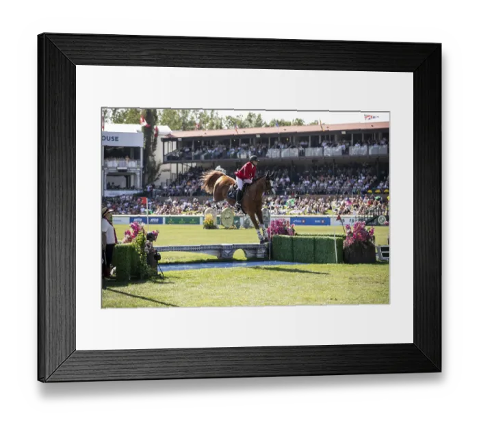 Framed Print : Erynn Ballard of Canada and riding De Flor 111 Z Santa Rosa compete in the first round of the 1