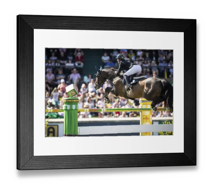 Framed Print : Michael Pender of Ireland and riding HHS Calais compete in the first round of the 1