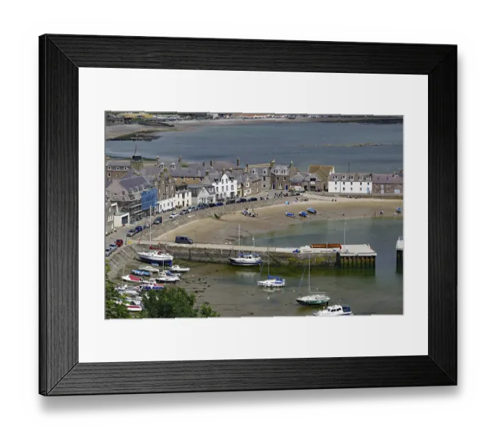 Framed Print : Small harbour with boats and surrounding houses on the coast