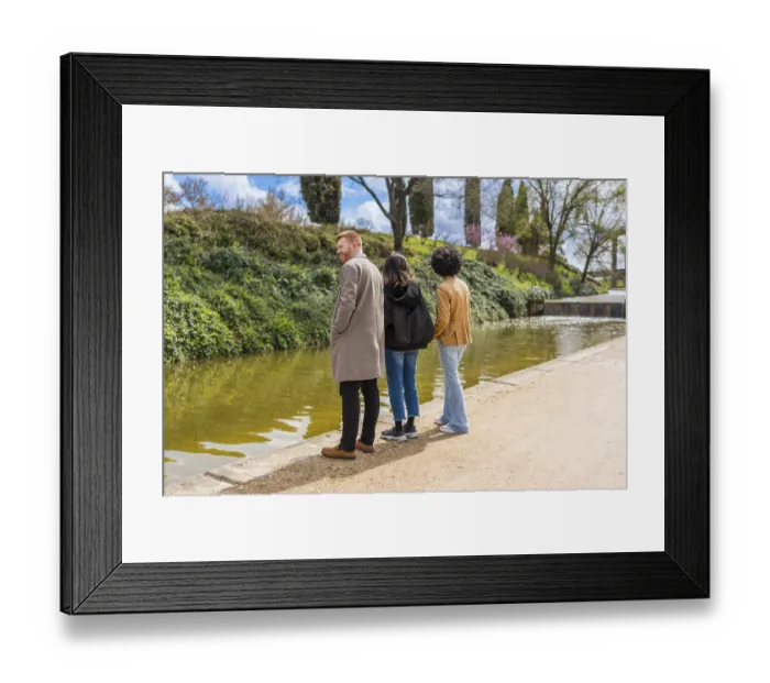 Framed Print : Three friends enjoying a relaxing day at the park