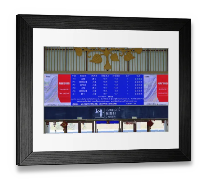 Framed Print : Display board in Chinese in the waiting hall of the modern railway station of Luang Prabang of the Laos-China Railway