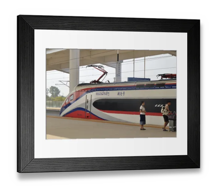 Framed Print : Express train of the Laos-China Railway LCR at the platform of the modern railway station of Vientiane