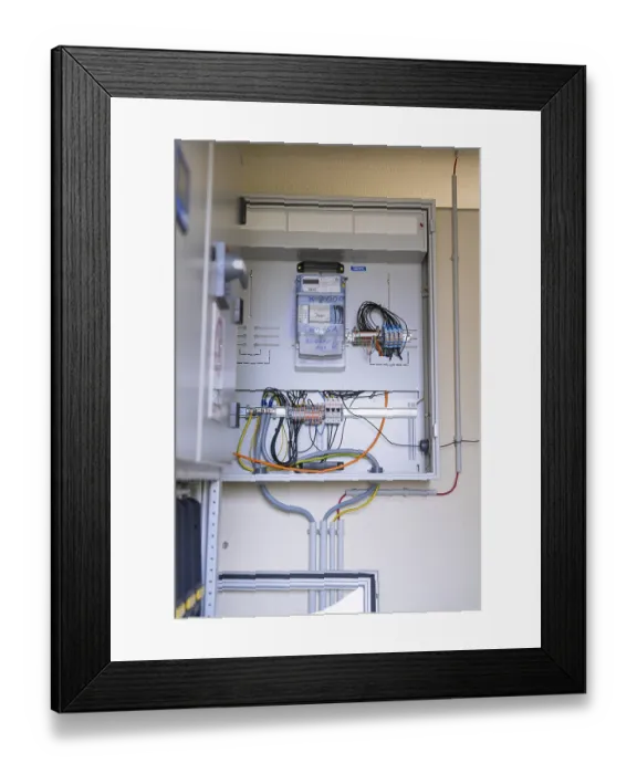 Framed Print : Open electrical box with numerous wires and technical equipment