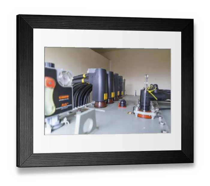Framed Print : Detailed view of a transformer with several cable connections