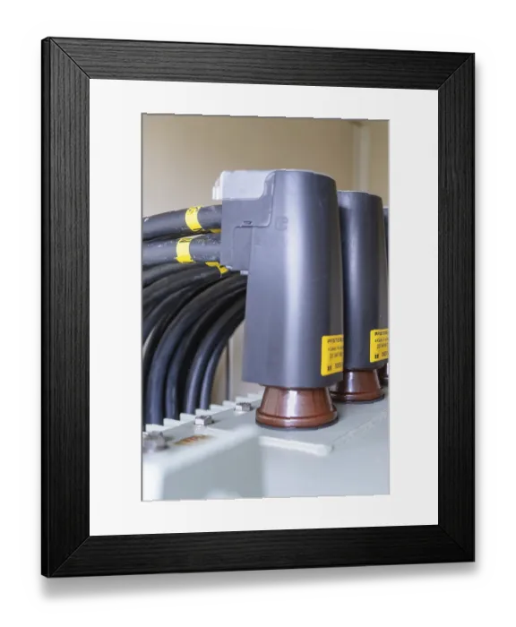 Framed Print : Close-up of plug connections and cables on a transformer Framed Print : Close-up of plug connections and cables on a transformer