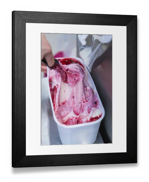 Framed Print : Close-up of red and white ice cream in the container
