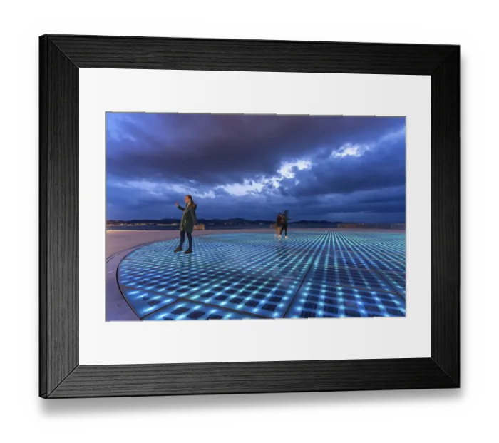 Framed Print : Artwork and solar installation Greeting to the sun at dusk