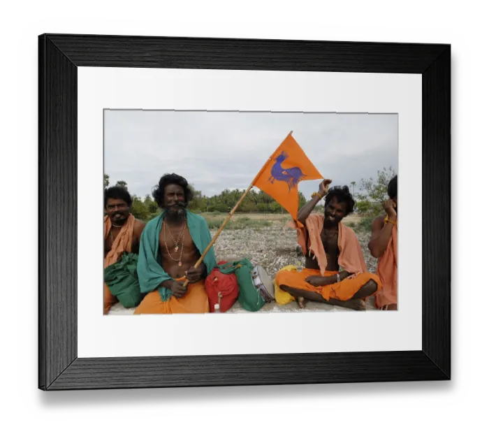 Framed Print : Pada yatra or foot pilgrimage holding flag with cock emblem during Vaikasi