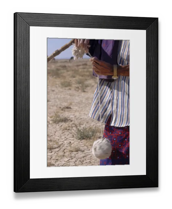 Framed Print : Making thread out of sheep wool