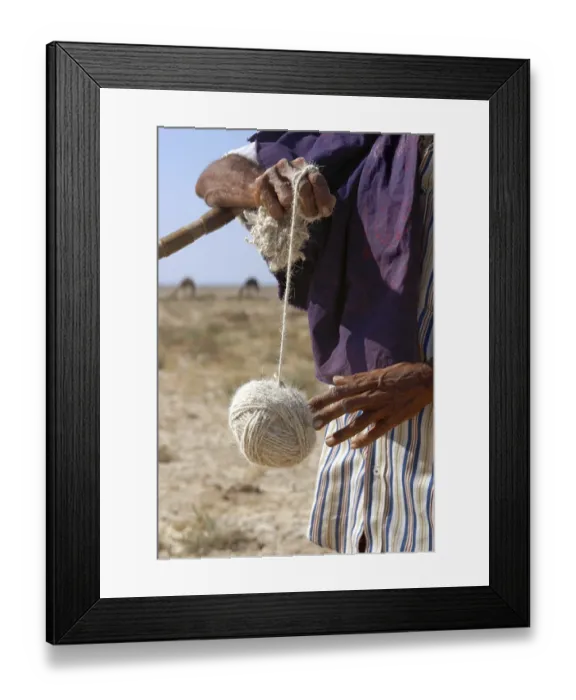 Framed Print : Making thread out of sheep wool