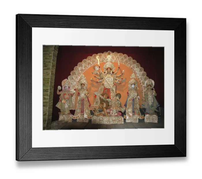 Framed Print : Decorative Durga clay model killing demon mahishasura with statues of kartikeya ganesha Framed Print : Decorative Durga clay model killing demon mahishasura with statues of kartikeya ganesha