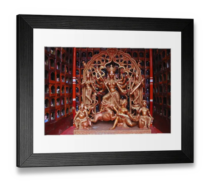 Framed Print : Durga clay model killing demon mahishasura with statues of kartikeya ganesha and lakshmi saraswati on Durga puja Framed Print : Durga clay model killing demon mahishasura with statues of kartikeya ganesha and lakshmi saraswati on Durga puja