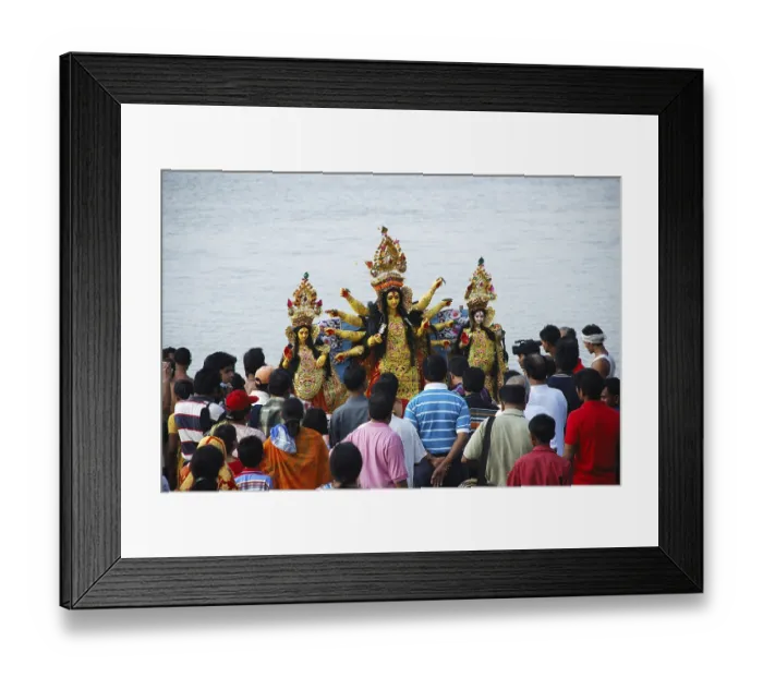 Framed Print : Immersion of Durga clay model with statues of kartikeya ganesha and lakshmi saraswati on immersion