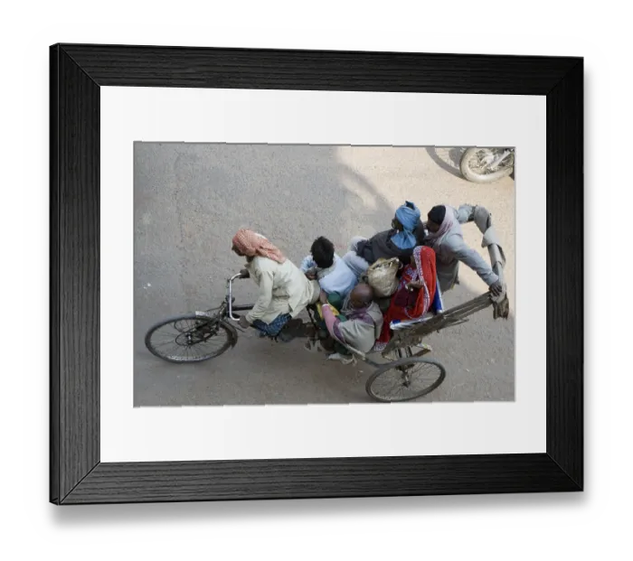 Framed Print : Passengers sitting in cycle rickshaw