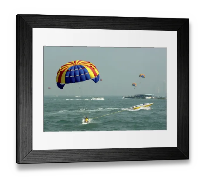 Framed Print : Thrilling Experience Parasailing water sport at Pattaya