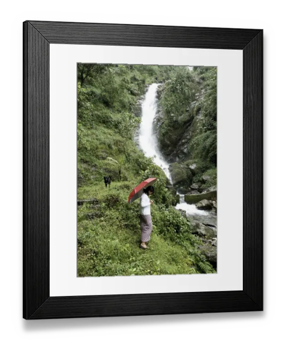 Framed Print : Rural woman at waterfall, Pastanga, Sikkim, India