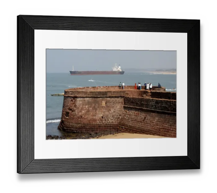 Framed Print : Tourists enjoying the views from the Fort Aguada in North Goa