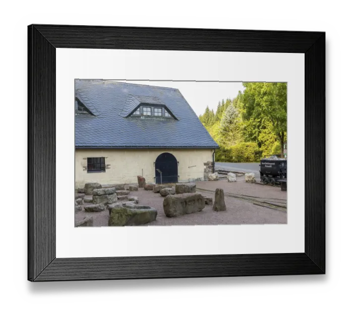 Framed Print : Lapidarium with stone evidence of mining machine technology in front of the hat house of the Vereinigt Zwitterfeld