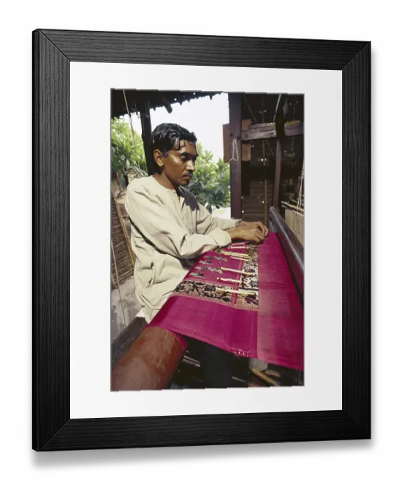 Framed Print : Banarasi saree weaver on his loom