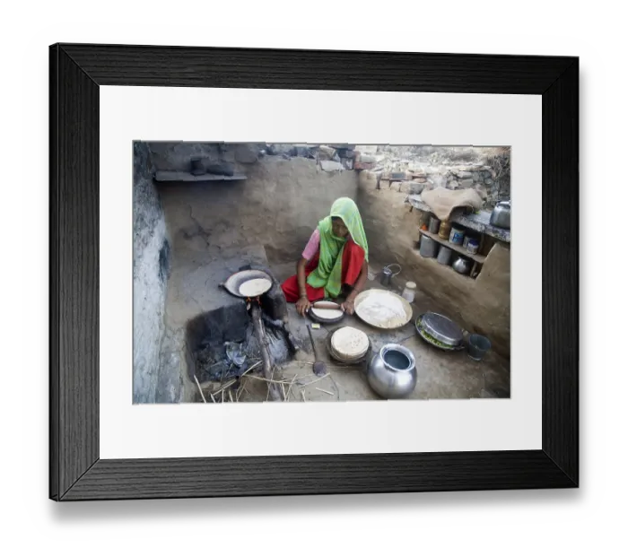Framed Print : Indian rural woman making chapaati bread
