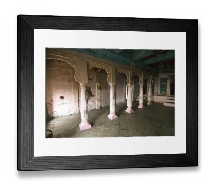 Framed Print : Wooden and pink pillars in temple at Shivneri fort
