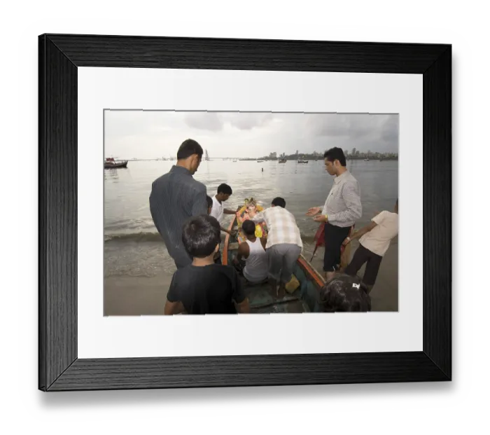 Framed Print : Immersion ceremony of lord ganesh elephant headed god at Mahim beach