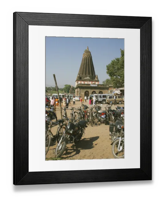 Framed Print : Temple dedicated to lord ganesh named dholu ganpati with bicycles motorcycles and cars in parking lot Framed Print : Temple dedicated to lord ganesh named dholu ganpati with bicycles motorcycles and cars in parking lot