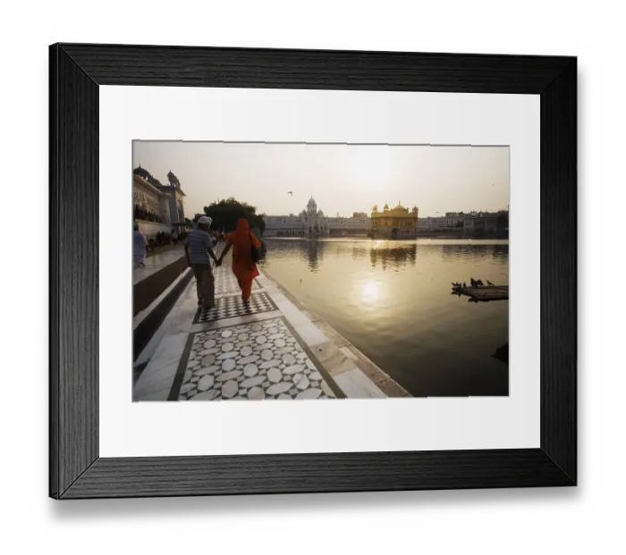 Framed Print : Mother and son walking marble design around the holy water pool bathing ghat Framed Print : Mother and son walking marble design around the holy water pool bathing ghat