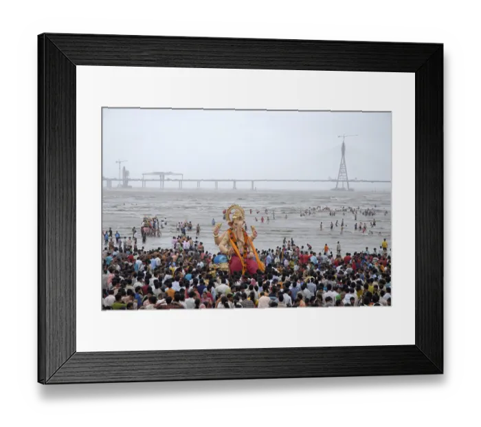 Framed Print : People taking huge lord ganesha idol for immersion at Chowpaty