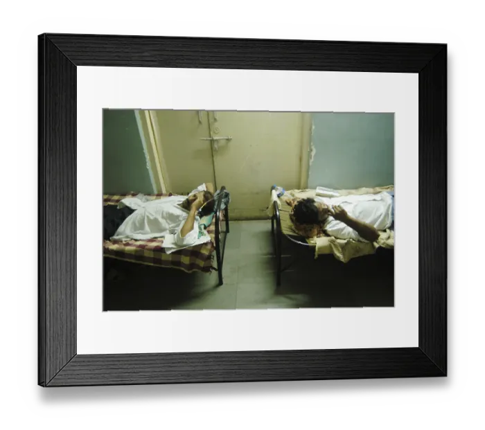 Framed Print : Patients being treated in the municipal hospital due to over crowding