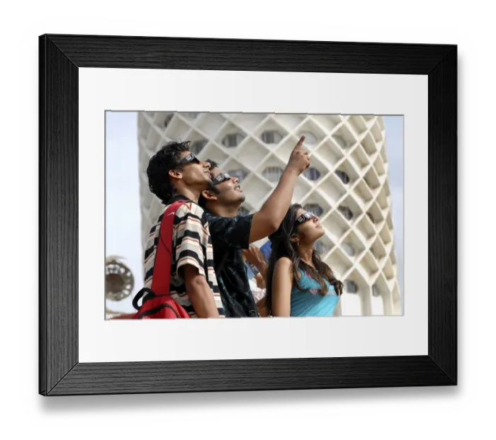 Framed Print : Three teenagers watch partial solar eclipse by wearing a protected filter on 1st August 2008 at Nehru Centre Bombay Framed Print : Three teenagers watch partial solar eclipse by wearing a protected filter on 1st August 2008 at Nehru Centre Bombay