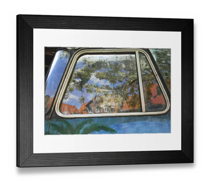 Framed Print : Reflection of roof tops of homes, Germany