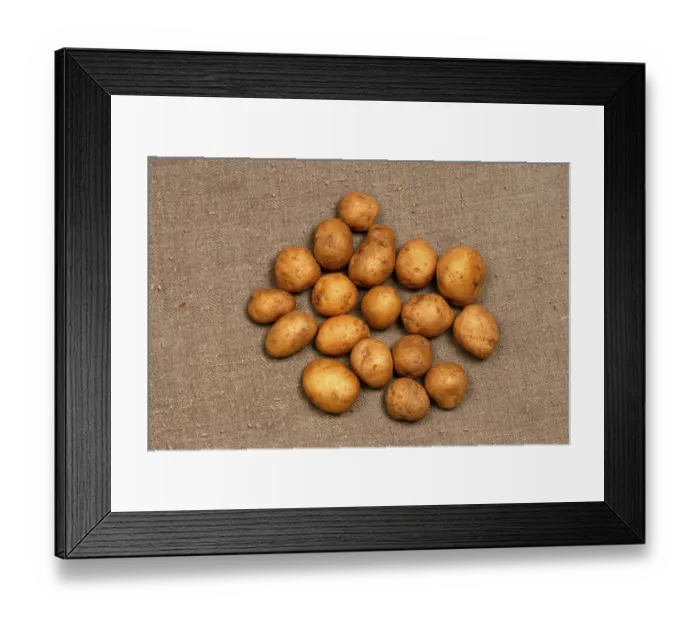 Framed Print : Potatoes on tabletop, India