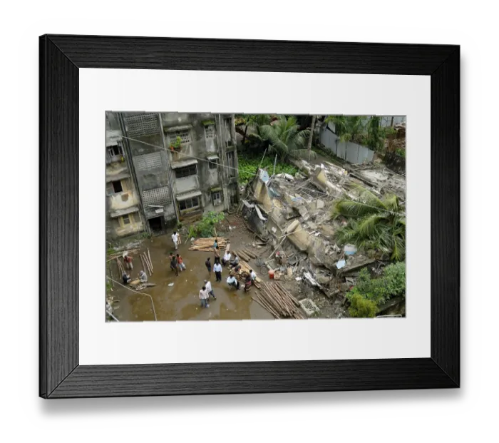 Framed Print : Twenty-five years old building collapsed after it developed cracks in between two buildings Mulund