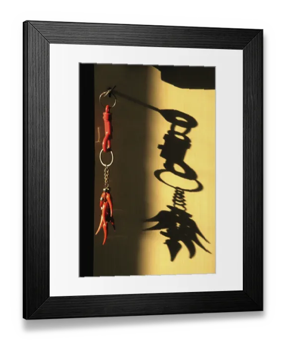 Framed Print : Red keychain and shadow 17th-March-2010
