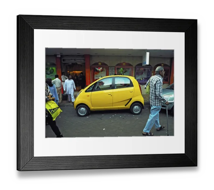 Framed Print : Tata nano car parked on the street